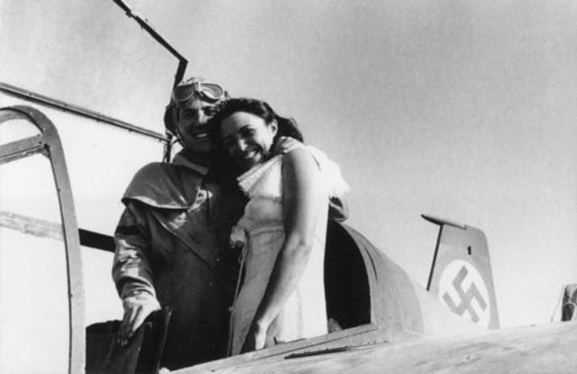 Allen posing with one of the Nazi pilots