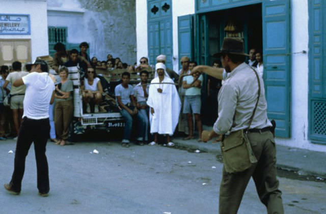 Ford practicing his whip during one of the bazaar scenes