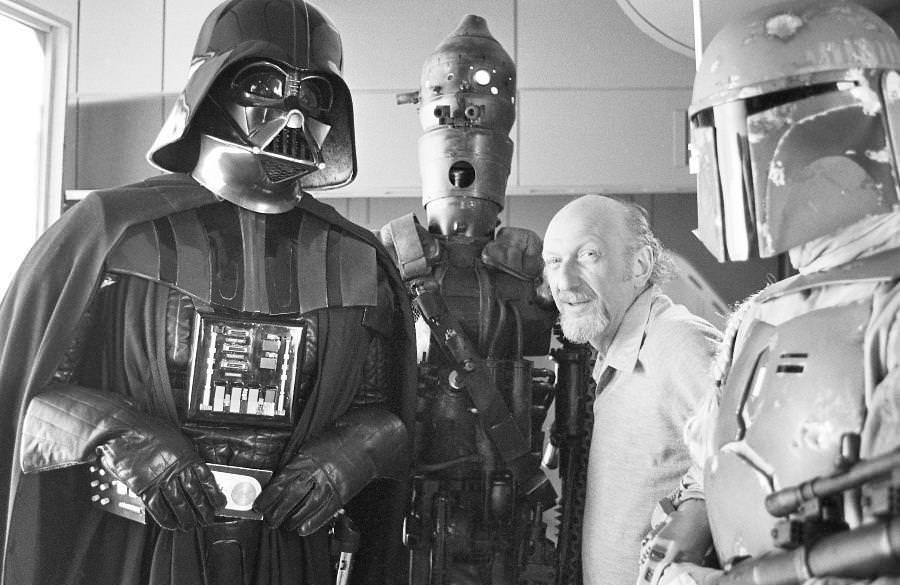 Director Irvin Kershner poses with some of the bad guys from The Empire Strikes Back.