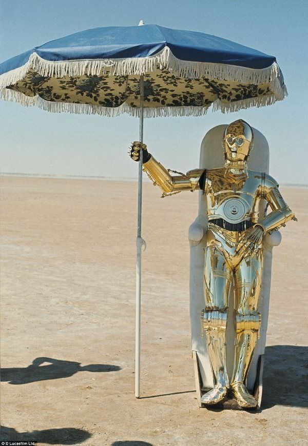 Anthony Daniels struggles to not be cooked in his suit by the unforgiving sun.