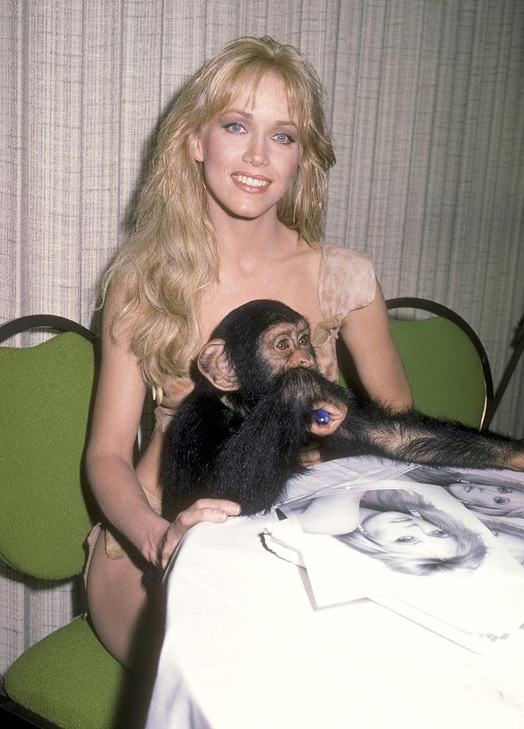Tanya Roberts holding a monkey at an Exclusive Photo Session to Promote Her New Movie "Sheena' Queen of the Junge" on November 2, 1983
