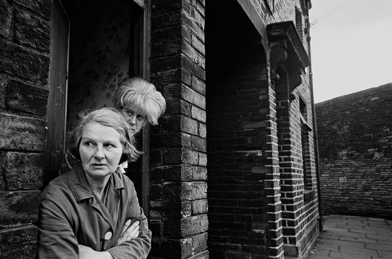 Mother and daughter living slum terrace, Bradford, 1969