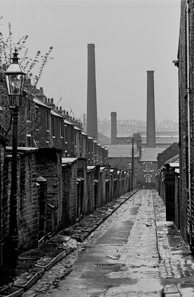 Backyard of slum houses, 1969