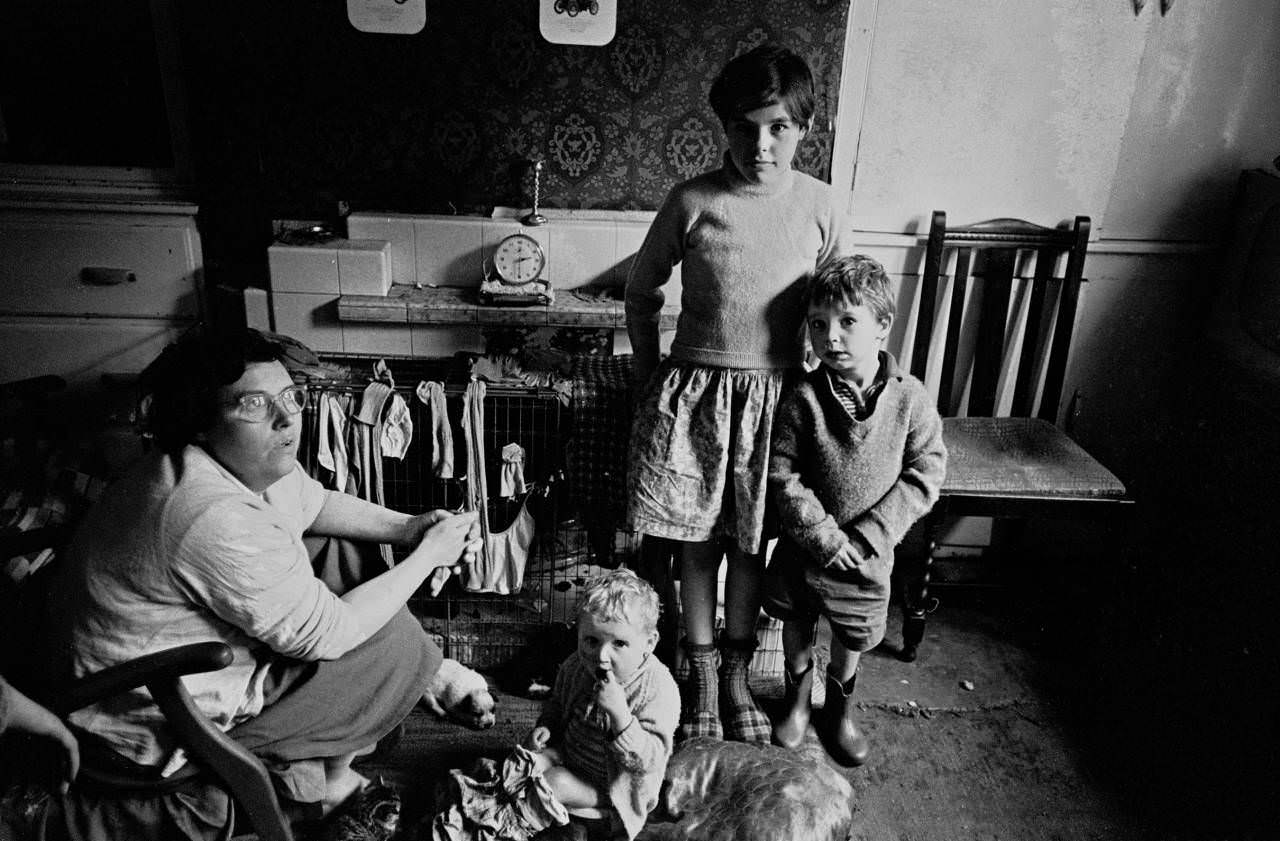 Family living in an overcrowded property, Bradford, 1969