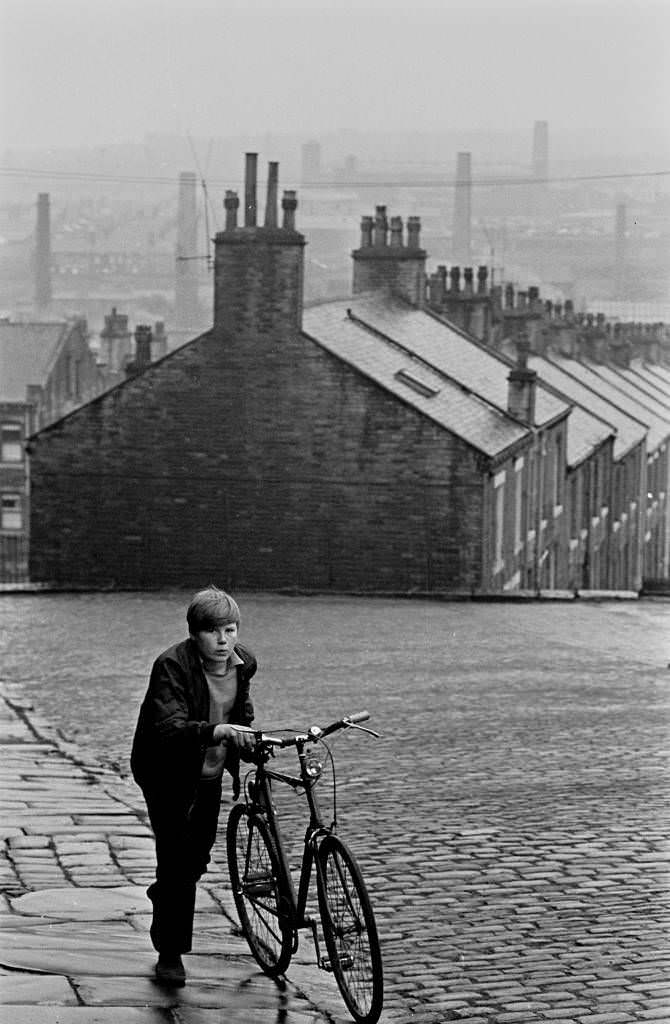 Bot and bicycle on a Bradford hill, 1969