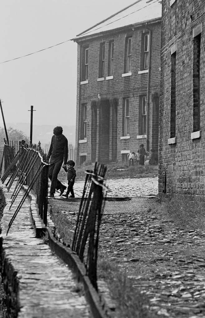 Father and child Bradford terraced street, 1972