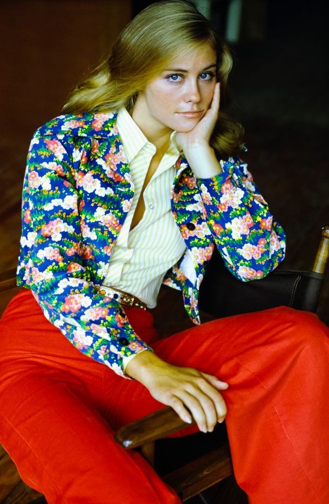 Cybil Shepherd sits wearing a Butterick Pattern ensemble, Glamour 1973.