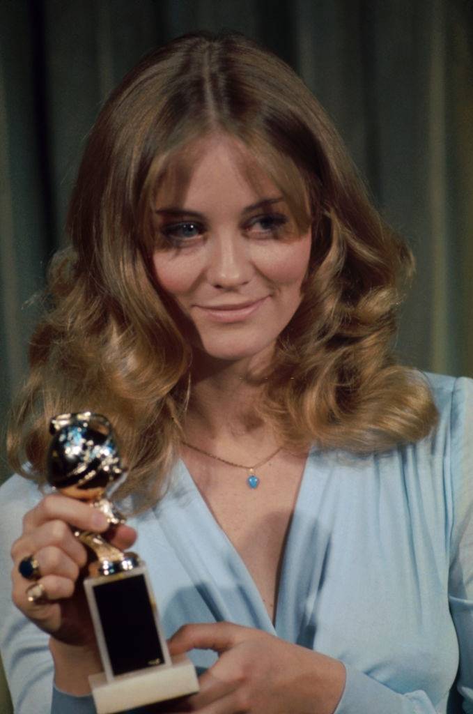 Cybill Shepherd holds a Golden Globe Award in 1973.