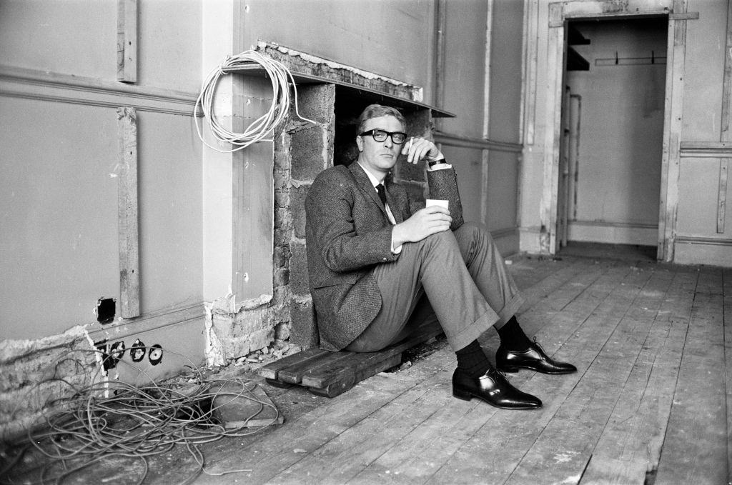 Michael Caine on the set of 'The Ipcress File', 21st September 1964.