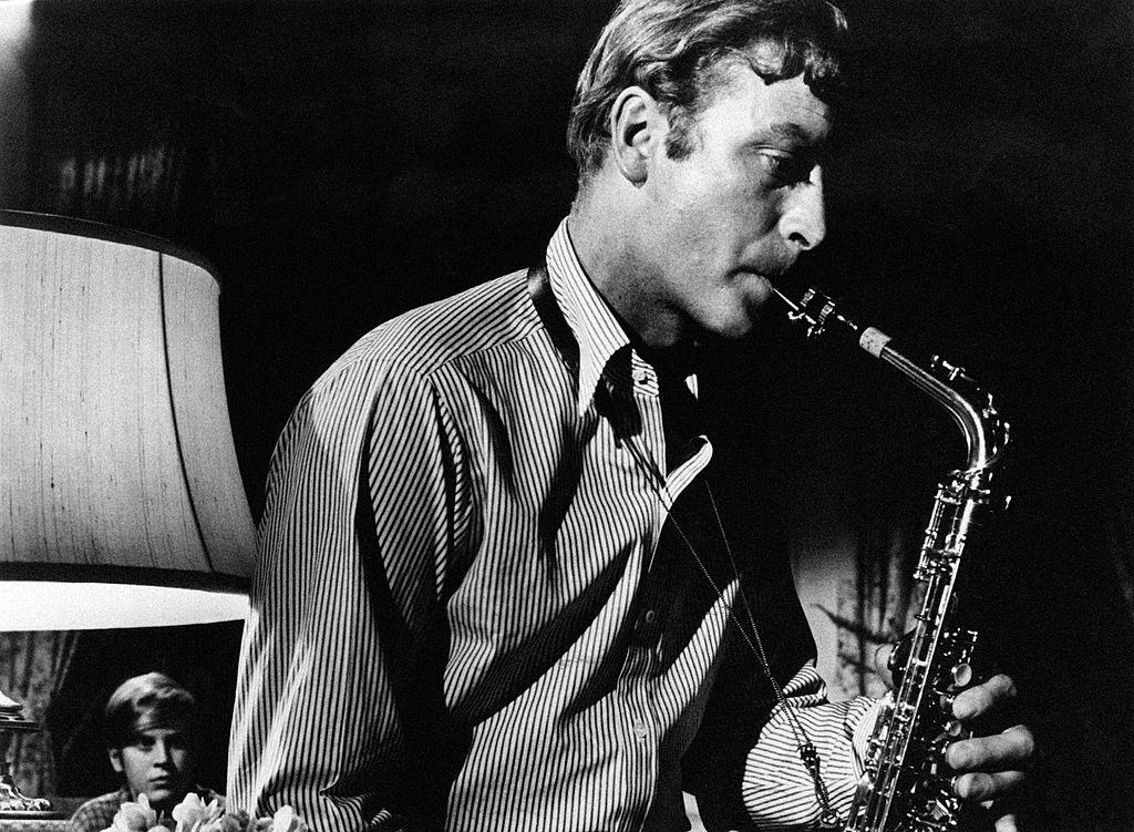Michael Caine plays a clarinet in a scene from Otto Preminger's Hurry Sundown', 1966.