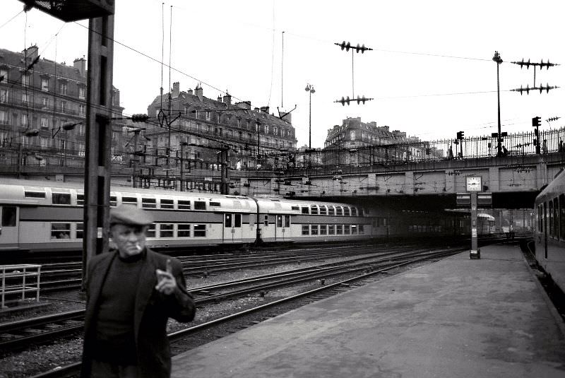 Man smoking cigarette, Paris, 1978