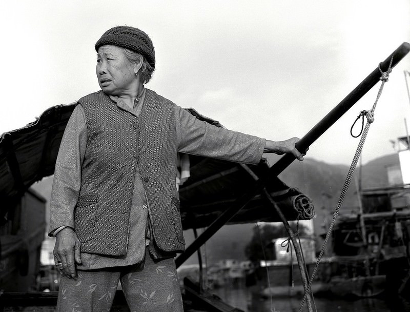 Water taxi driver. Hong Kong, 1987.