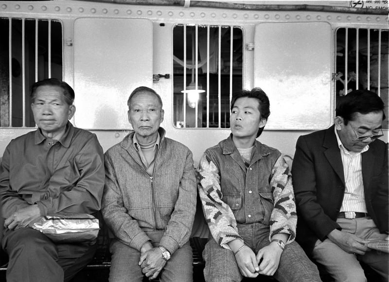 Passengers aboard the Star Ferry between Kowloon and Hong Kong, 1986.