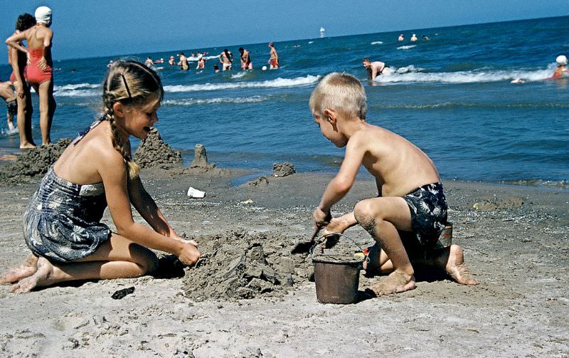 Playing on the beach at Cedar Point, Ohio. December 1954