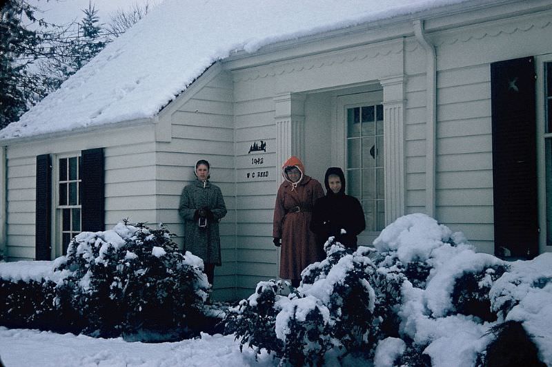 Posing in front of the house, Ohio. December 1959