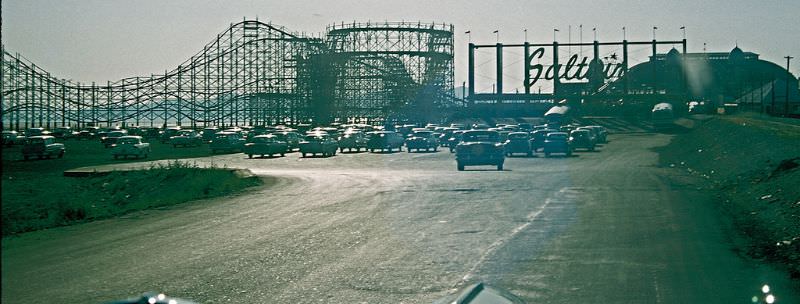 Parking lot and roller coaster at Saltair Park, Utah. July 1956