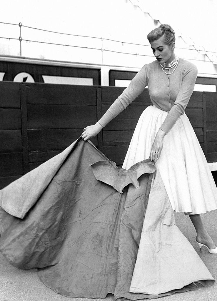 Anita Ekberg pretending to be a bullfighter, 1951.