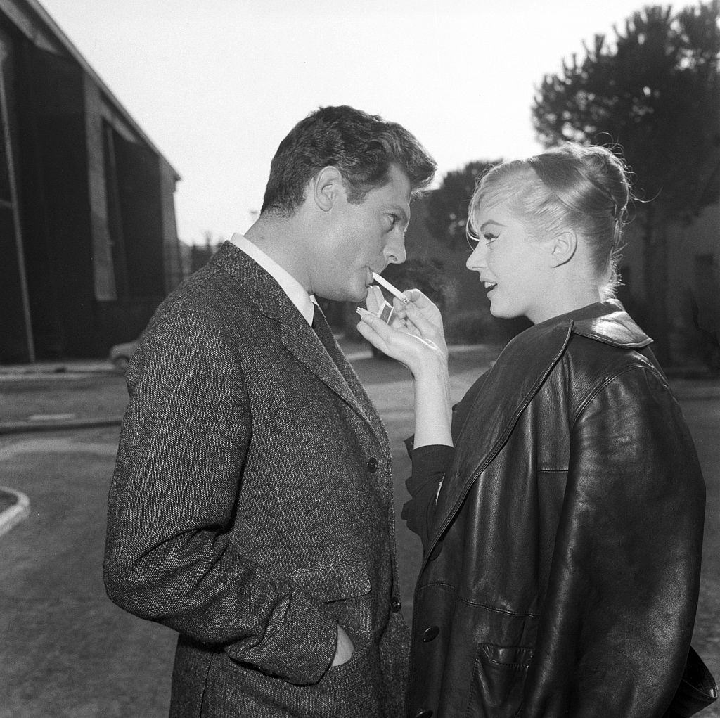 Anita Ekberg with Marcello Mastroianni on the set of La Dolce Vita, 1954.