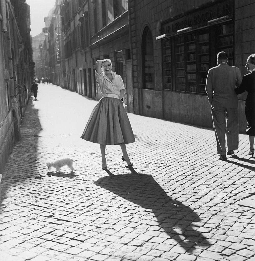 Anita Ekberg wearing a full skirt in Rome, 1955.