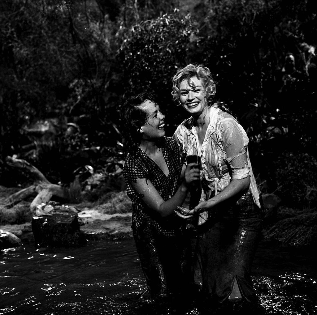 Anita Ekberg with Phyllis Kirk on the set of "Back from Eternity" in Los Angeles, 1956.
