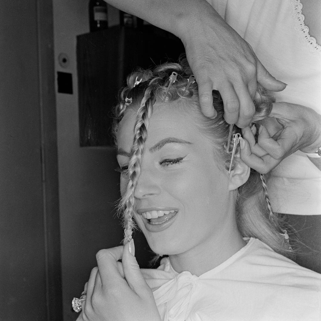 Anita Ekberg getting ready for a shoot, 1959.