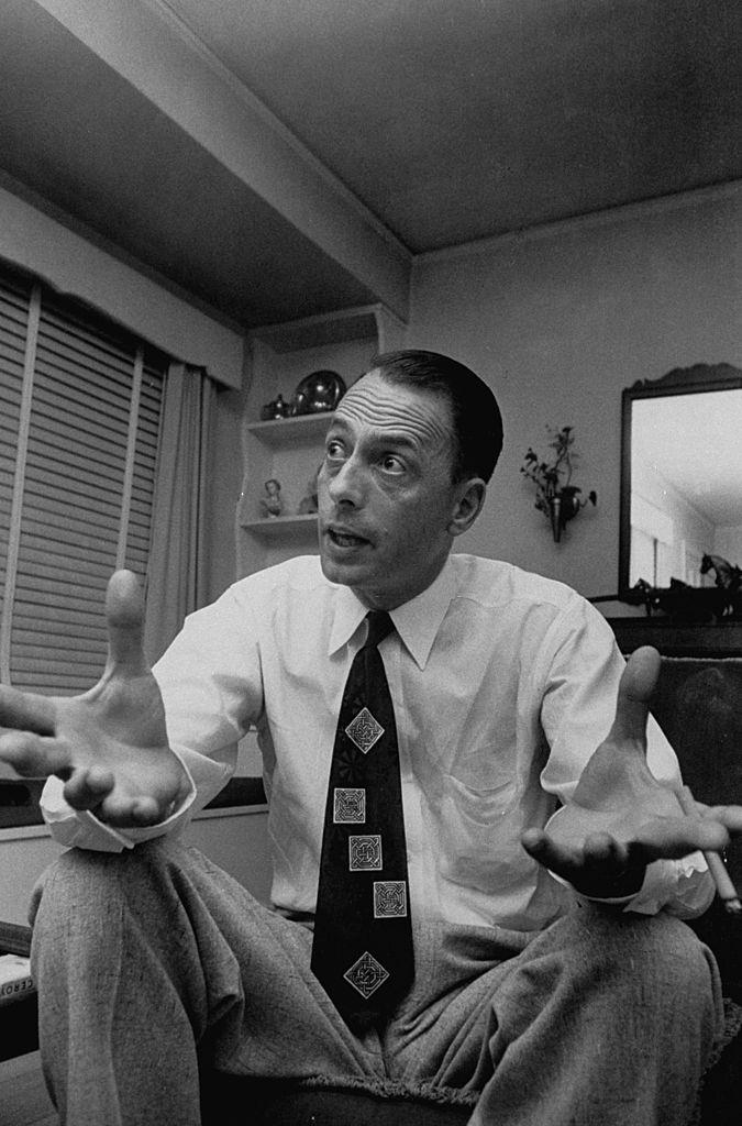 Mayor Ed Howard, as he sits and gestures during a discussion about the aftereffects of a meteorite which struck Ann Elizabeth Hodges when it fell through the roof of her home.