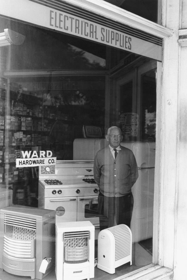Mr. Ward in the window of his hardware store, 1968