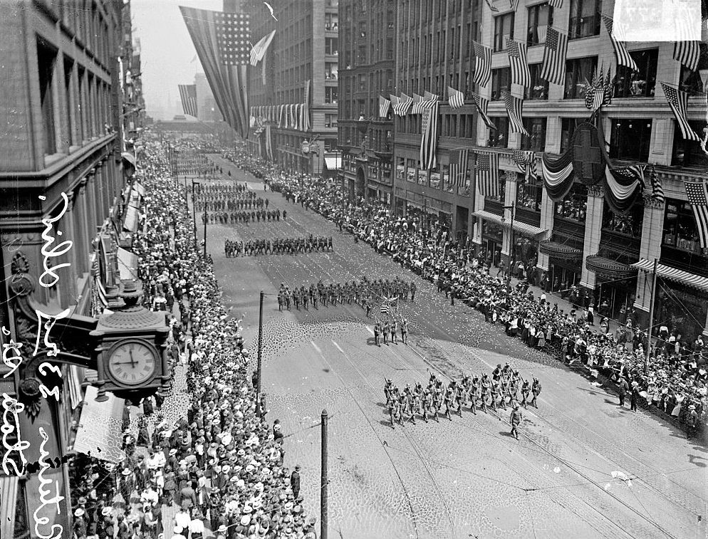 3rd Division soldiers marching in lines on North State Street in the Loop community area of Chicago, 1919.