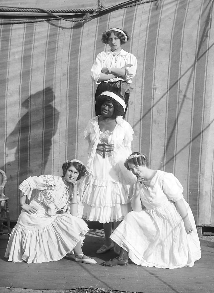 Four girls outside a tent, Duffy's Circus, 1911.