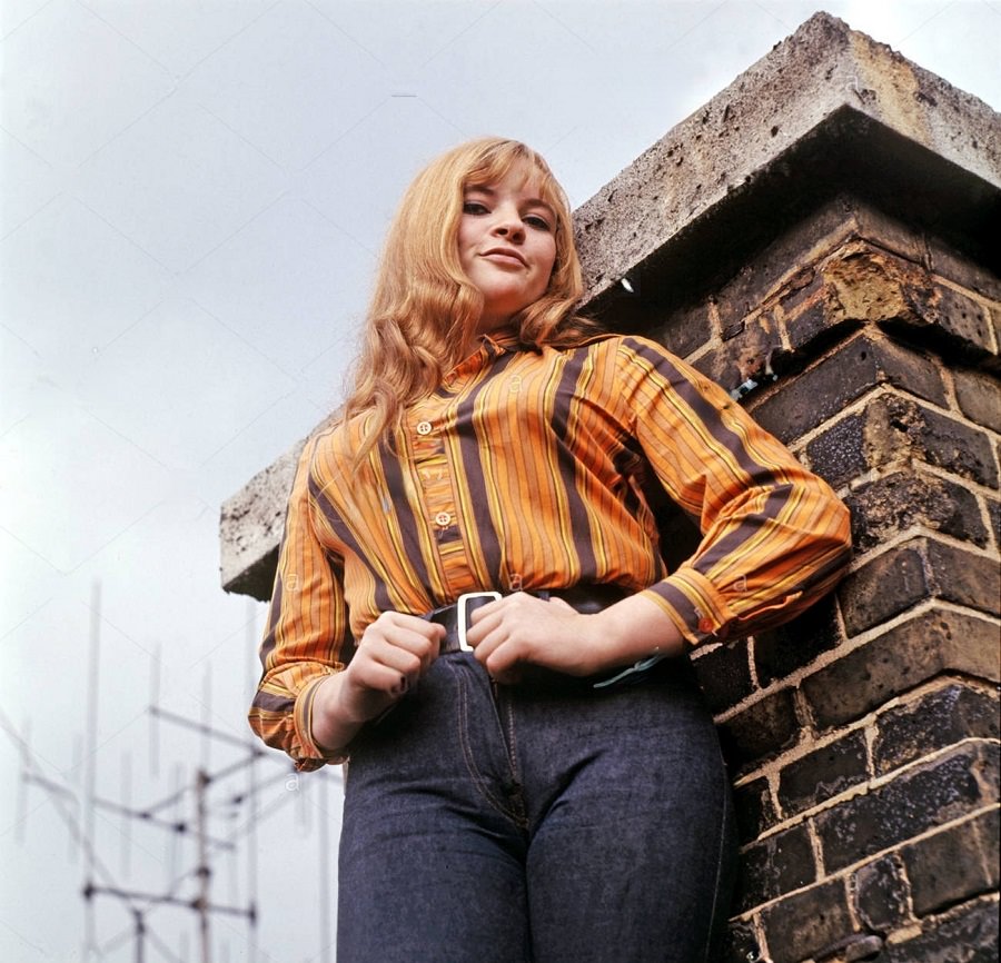 Dana Gillespie posing with chimney, 1971.