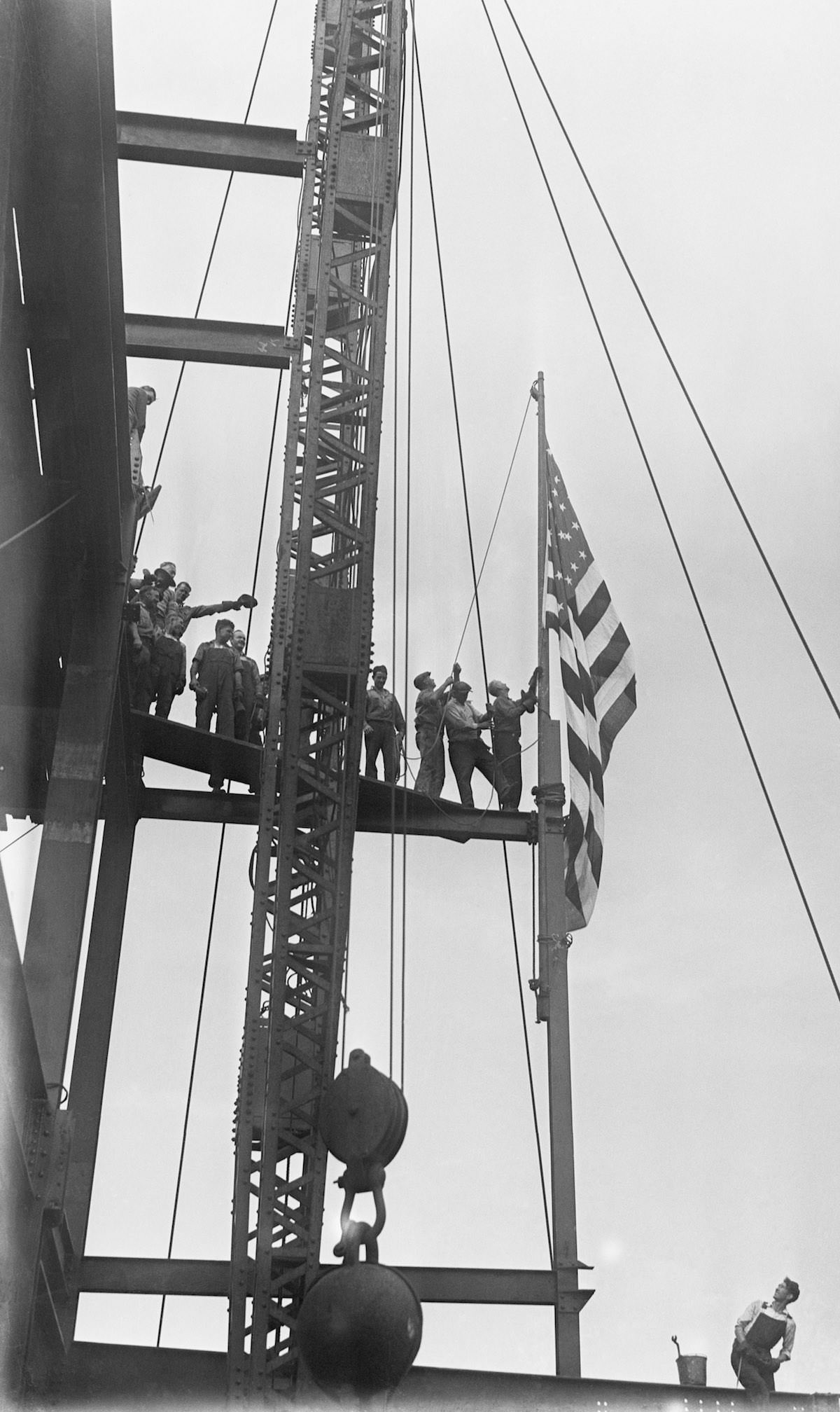 Workmen at the new Empire State building that is being erected on the site of the old Waldorf Astoria Hotel at 34th Street and 5th Avenue.