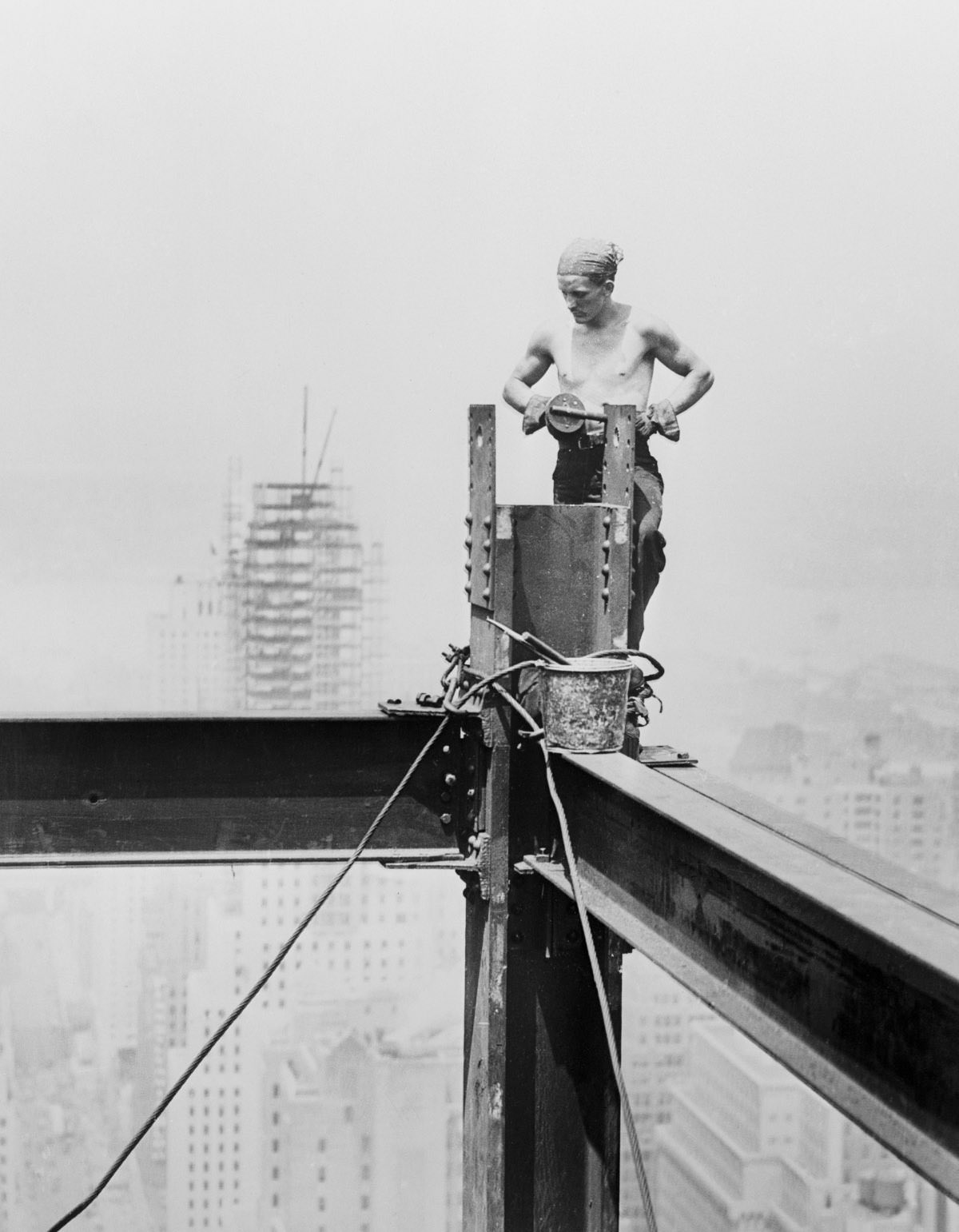 Erected on the site of the old Waldorf Astoria, this building will rise 1,284 feet into the air. A zeppelin mooring mast will cap this engineering feat.Sept. 29, 1930