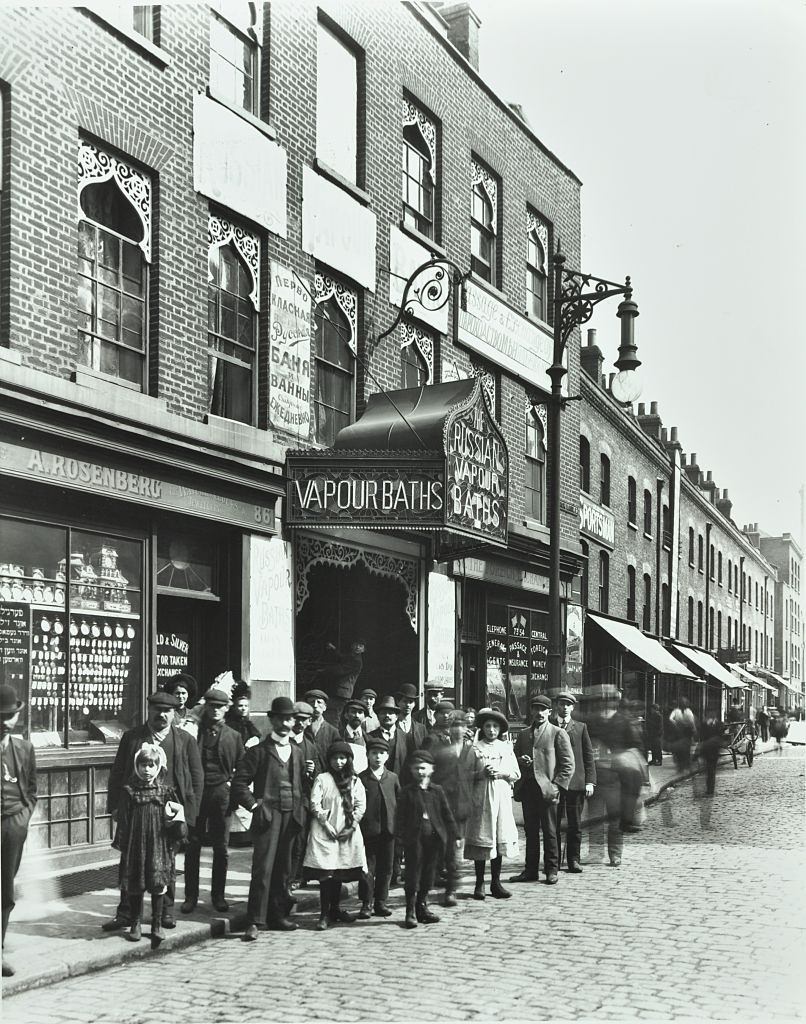 Crowd outside the Russian Vapour Baths, Brick Lane, Stepney, London, 1904.
