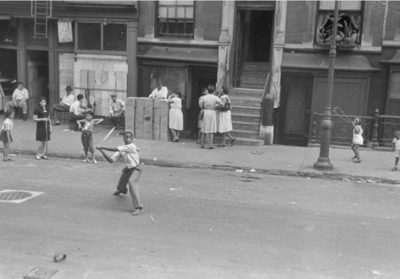 Kids playing baseball, 1947.
