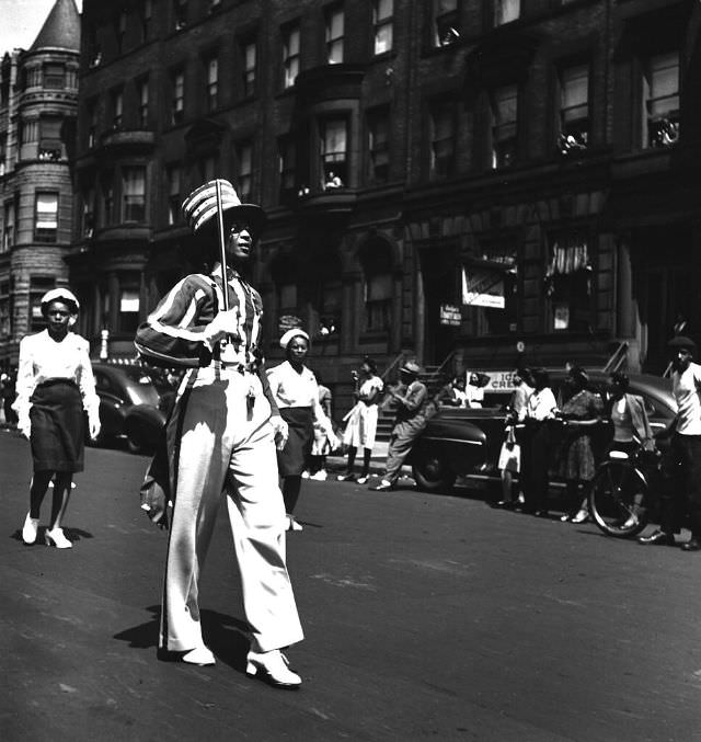 Parade participants marching, 1949.