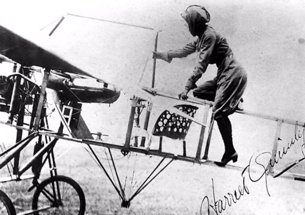 Harriet Quimby mounting her Moisant monoplane (from The American Review of Reviews, 1911)