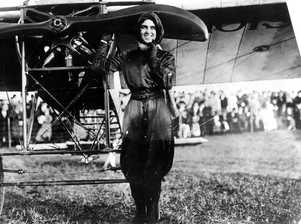 Harriet Quimby in her purple flight suit.