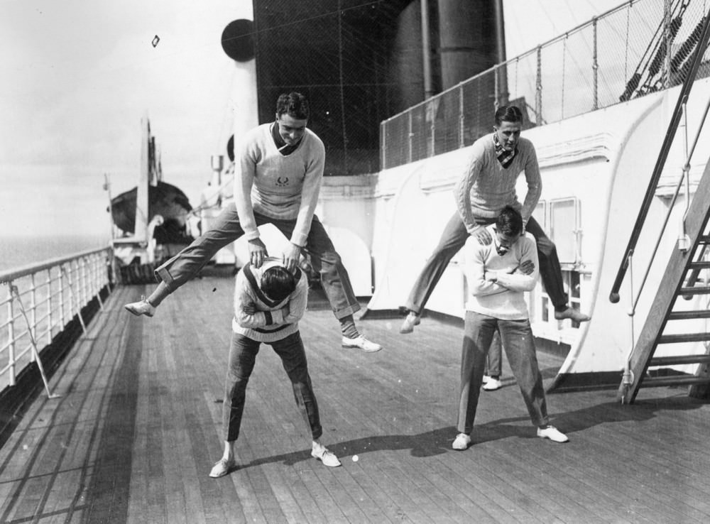 Oxford University relay team leap-frog to keep fit on board SS Berengaria on their way to the USA, April 1923.