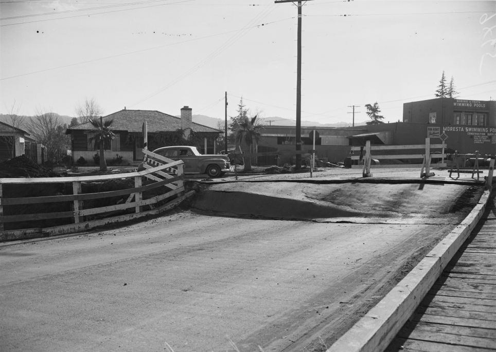 Van Nuys Boulevard bridge which sank three feet at south end due to washing away of earth foundation. January 1952.