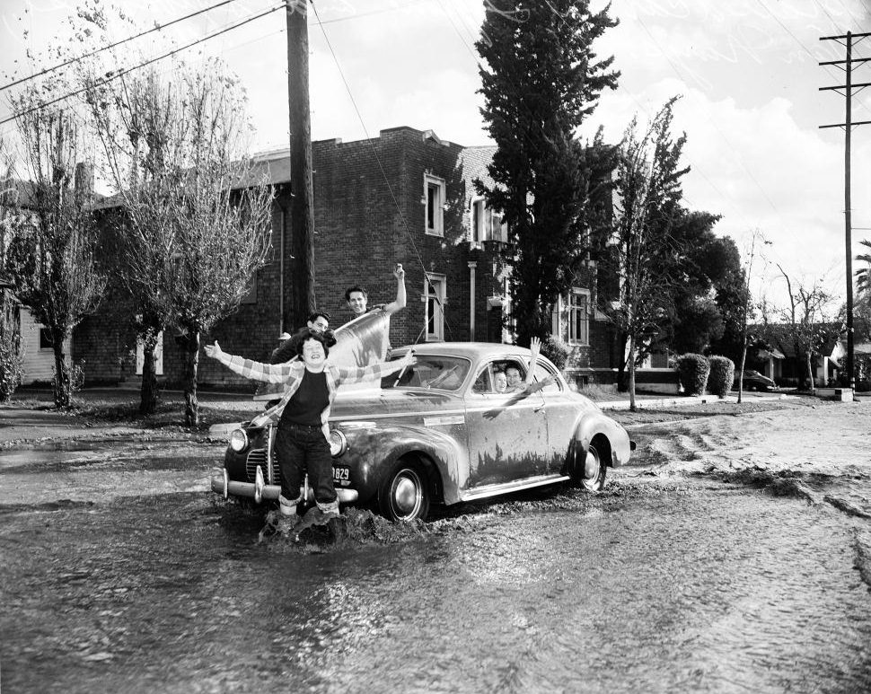 Kids in a stalled car at Sylvan Street. 1952.