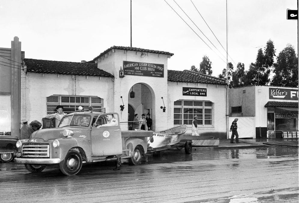 A life guard service truck along with boat to rescue the victims, Van Nuys. 18 January 1952.