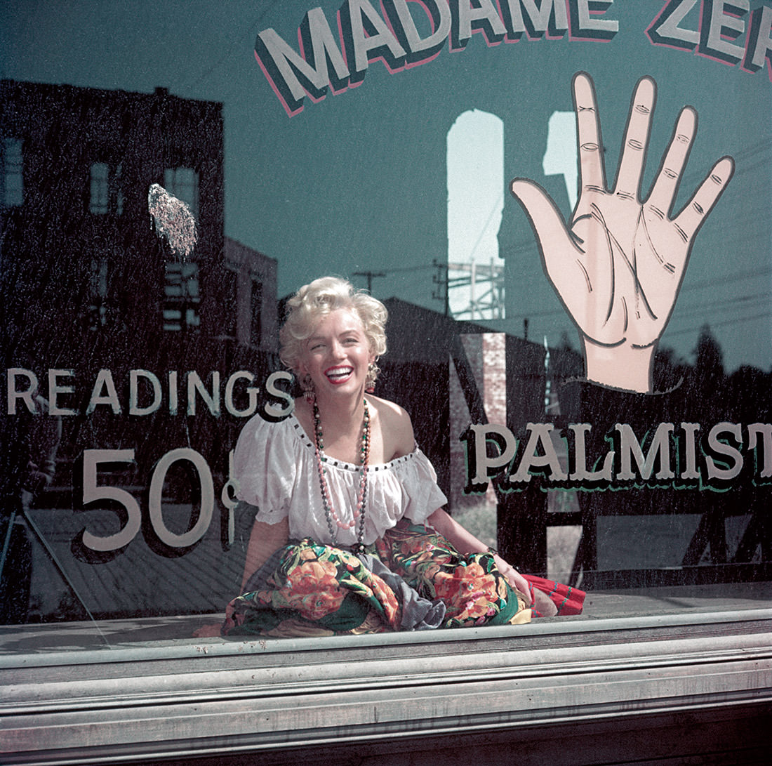 Monroe is dressed as a palm reader after she and photographer Milton H. Greene ransacked the 20th Century Fox costume department in April 1956.