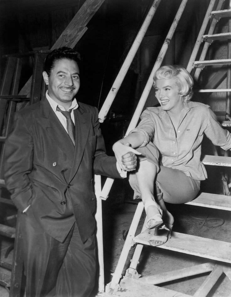 Sam Shaw and Marilyn Monroe, backstage at 20th Century Fox studio, Los Angeles, California, 1954.