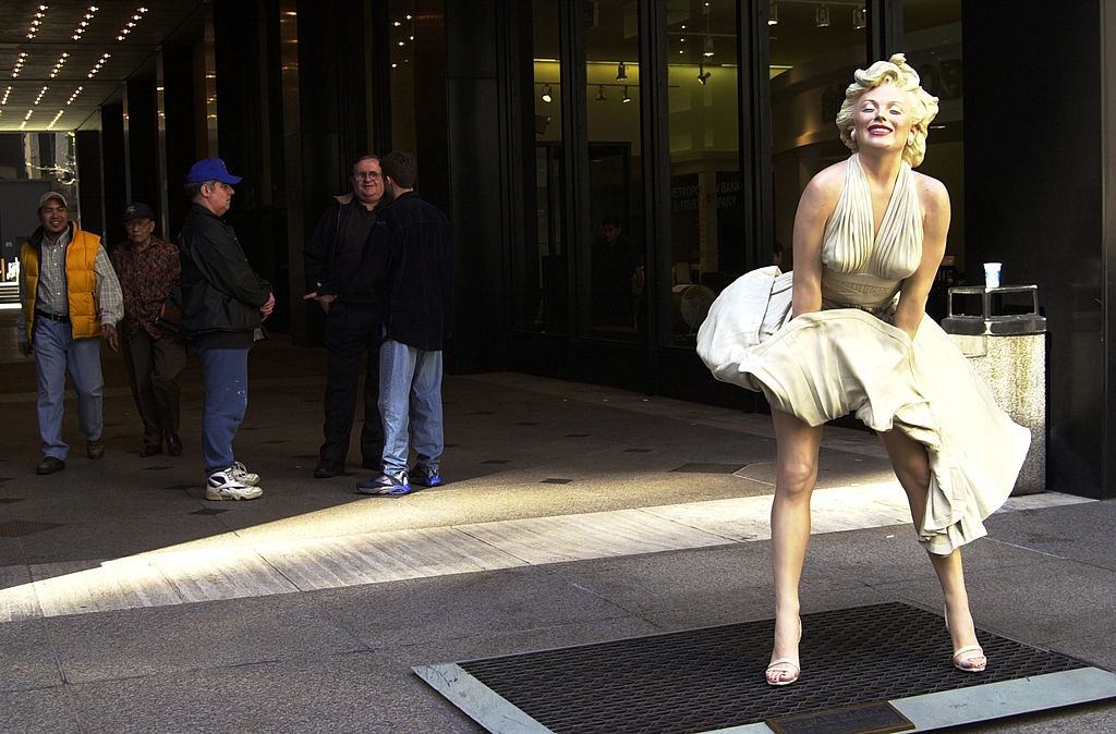 A life-size sculpture of Marilyn Monroe, crafted by artist J. at the entrance to the Harper-Collins building on E. 53rd St.