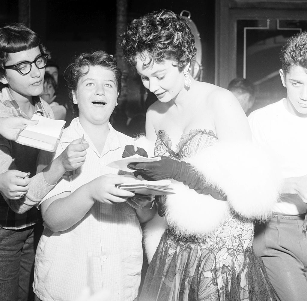 Marla English signs autographs for fans in Los Angeles, 1954.