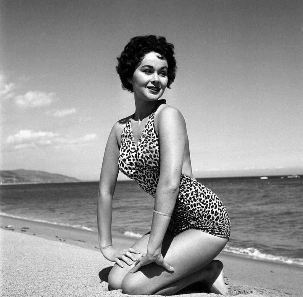 Marla English poses at the beach in Los Angeles, 1954.