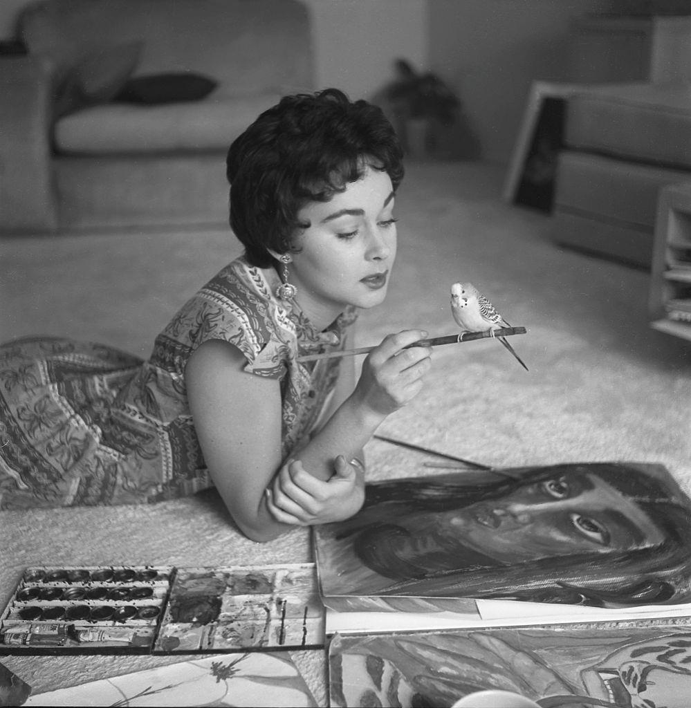 Marla English with her parrot, 1954.