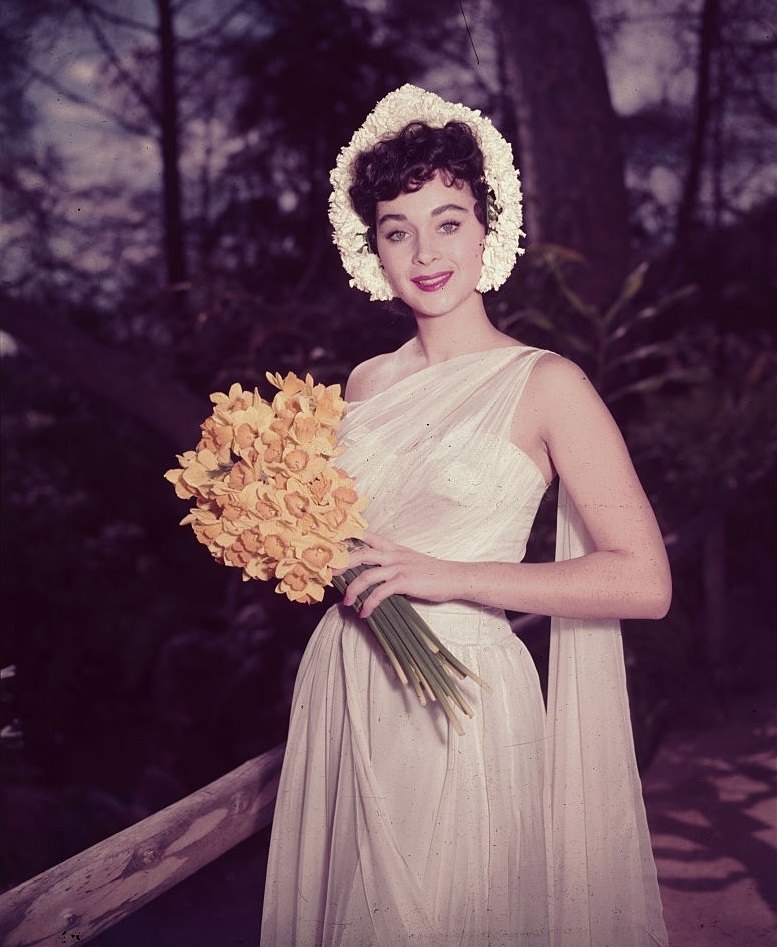 Marla English holding Yellow Hyacinths, 1954.
