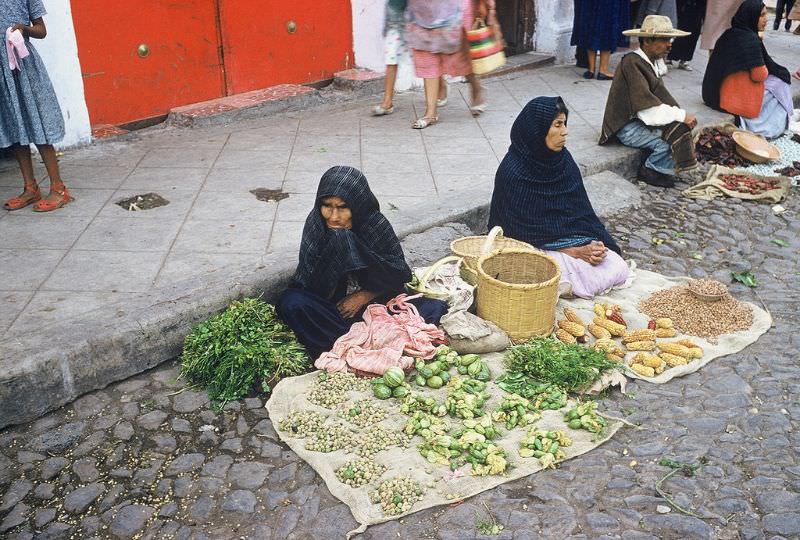 Mexican women selling corn and other vegetables, Queretaro. December 1958