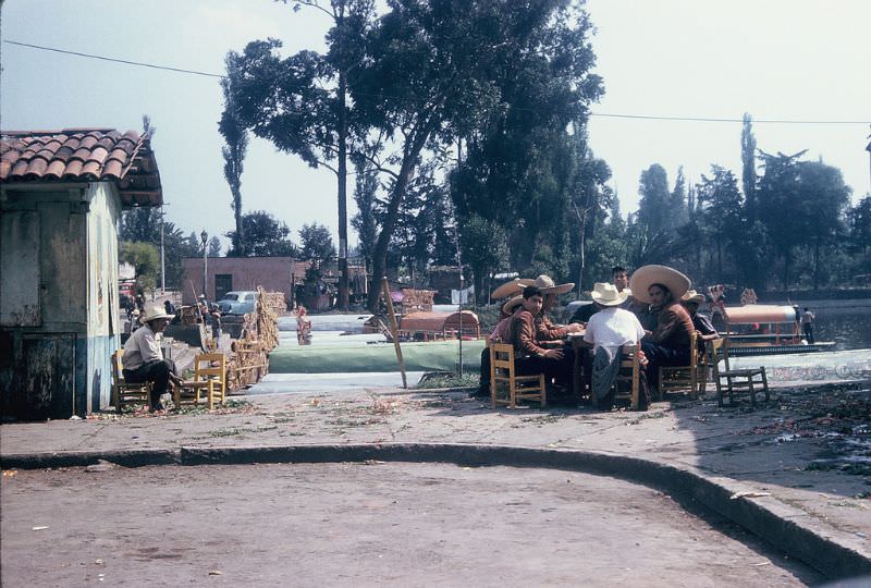 Boatmen playing dominos at Xochimilco, Mexico City. December 1958